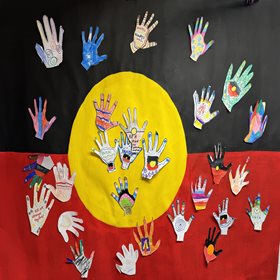 Image of reconciliation hands artwork