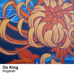 A painted mural of a flower with orange tones with a blue blackground.